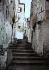 great photo of italian small town (south of rome) with woman         